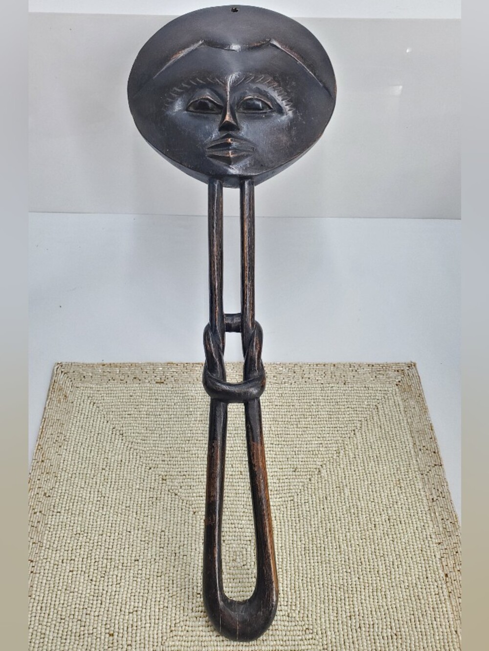 Ashanti Akua'ba fertility-inspired wooden wall hanging from Ghana. (C41)